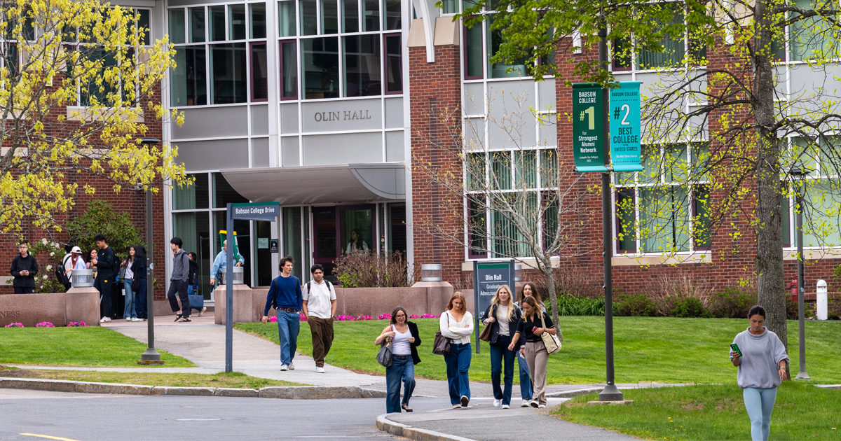 Students walk outside the FW Olin Graduate School of Business at Babson College