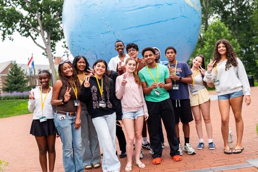 Young adults on Babson's campus during a summer program.