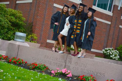 Students pose for a photo following commencement.