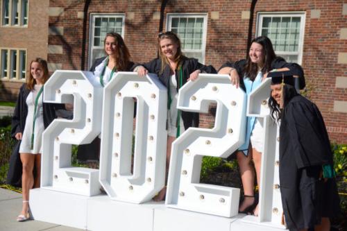 Students pose for a photo following commencement.