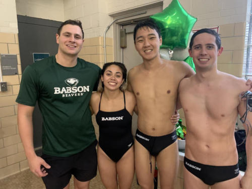 Tirza Rentovich '20 with seniors of the Babson Swimming and Diving team, Michael Cerny '20, Alexander Damiecki '20, Jack Lucero '20